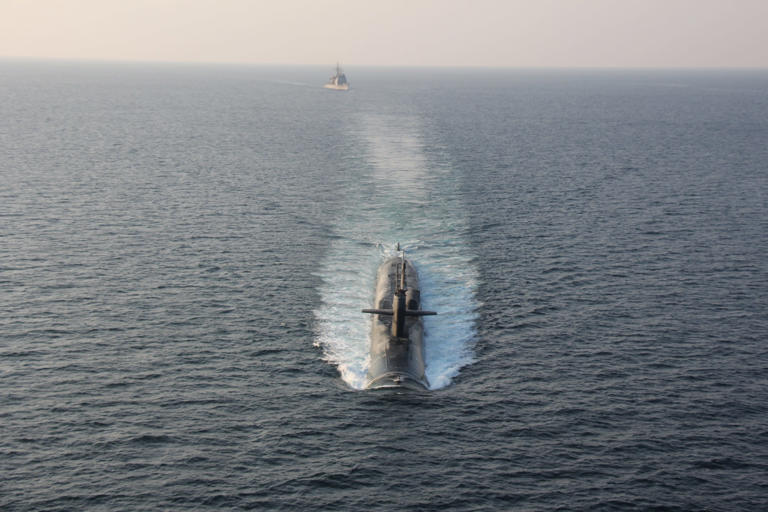 Submarine USS Georgia in the Strait of Hormuz with the cruiser USS Philippine Sea. US Navy courtesy photo