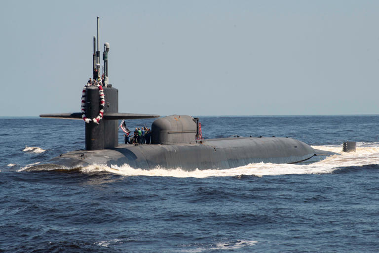 The Ohio-class guided-missile submarine USS Georgia returns to its homeport at Naval Submarine Base Kings Bay, Georgia. US Navy photo by Chief Mass Communication Specialist Ashley Berumen /Released